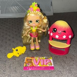 Tropical Shopkin Doll. Comes with brush, VIP card and prop. Great condition!